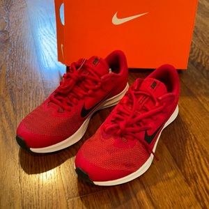 New in box - size 4 big kids Nike shoes